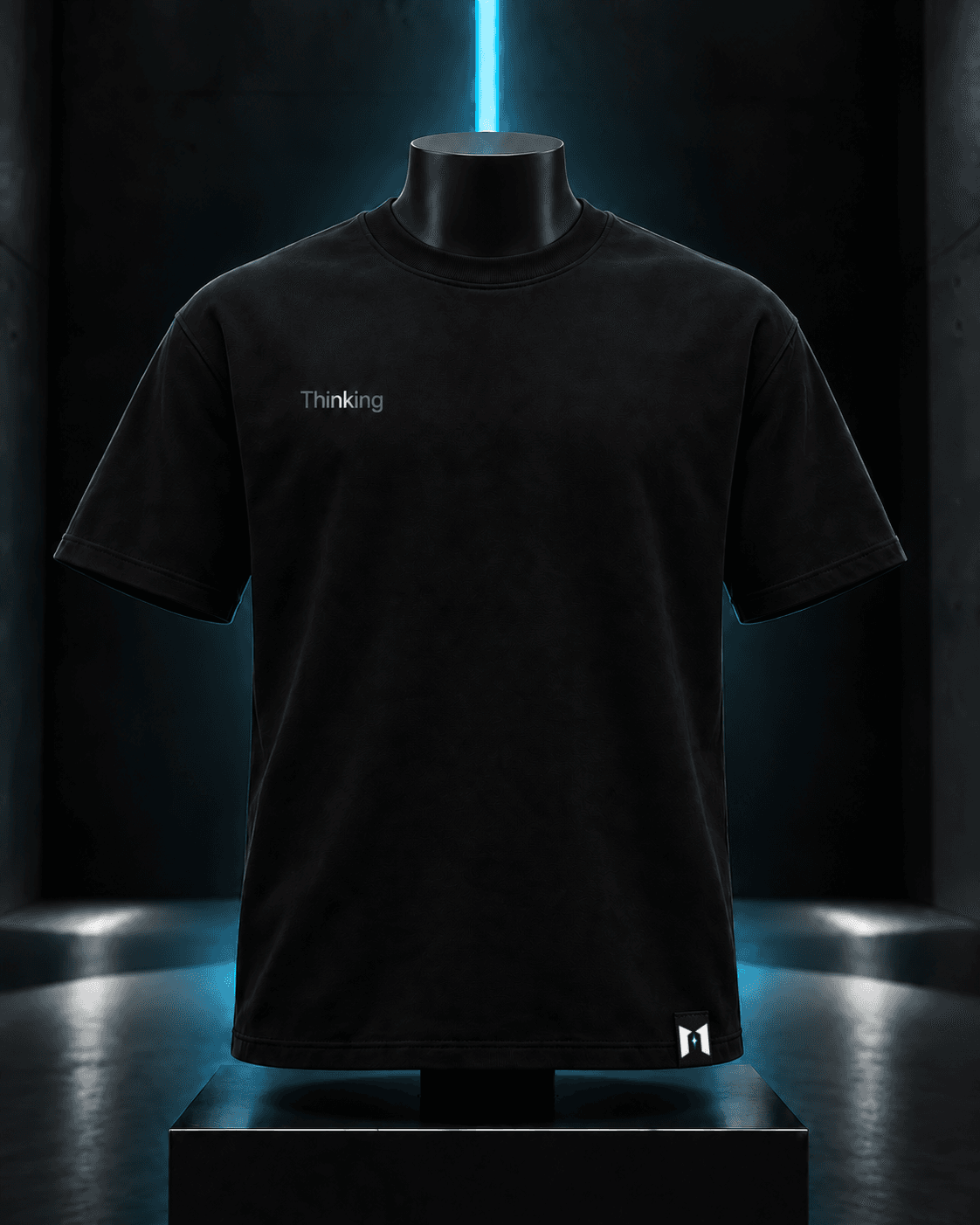 Artificial intelligence-generated concept of a black crewneck T-shirt with soft gray-to-silver Thinking lettering on the wearer-right chest and a DRKNYT gateway hem label